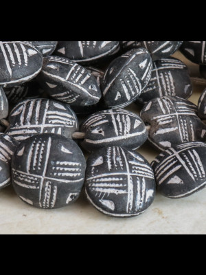 34 perles en terre cuite