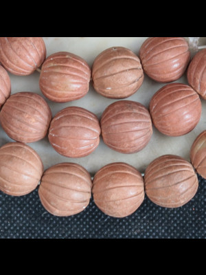 44 perles en terre cuite