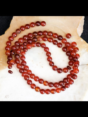 Fil de 100 perles rondes en cornaline