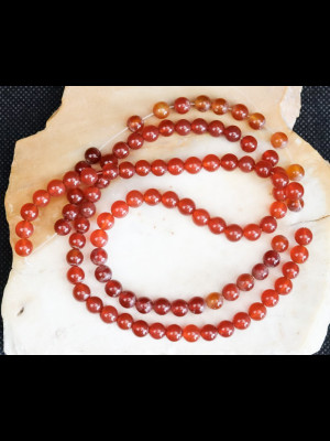 Fil de 98 perles rondes en cornaline