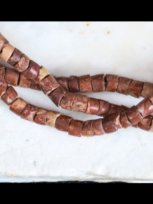 198 petites perles anciennes en bauxite